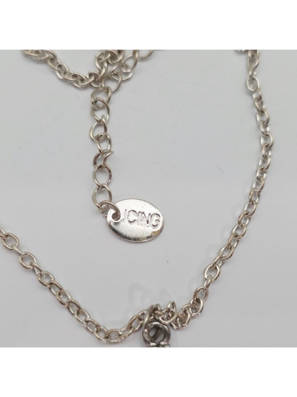 Silver Rhinestone Cross Pendant Necklace By Icing - Picture 4 of 7